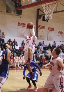 IWA senior Austin Rodgers jumps up for a layup. -- ANDREW FAISON/Tidewater News
