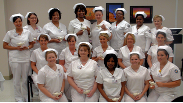 Southampton Memorial Hospital’s School of Practical Nursing students who advanced to the clinical phase are, from left in front, Brittney Lowe, Brandi Spivey, Shani Privott, Shannon Vaughan and Kayla Chandler; middle, Brittany Burgess, Sarah Bradshaw, Heather Jones, Donna Davis and Miriah Smith; and in back, Tori Ricks, Abby Griffin, Dominique Everett, Ashley Boyd, Michelle Lewis, Regina White, LaSandra Dallas-Mounger and Nan Evans.  SUBMITTED