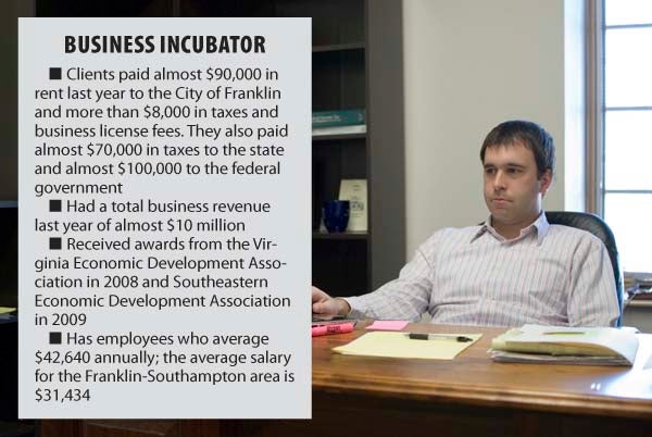 John Rabil Jr. owner of Rabil Law Firm, researches a case from his fourth-floor office at the Franklin Business Incubator. -- ANDREW FAISON/TIDEWATER NEWS