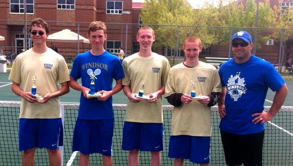 Doubles champions, from left, Tom Hogan and Setphen Hurst and Runners up Derek Klausmeier and Dan Klausmeier show off trophies at the first WHS Invitational Tennis Tournament, with organizer Coach Matthew Randall (right). -- SUBMITTED