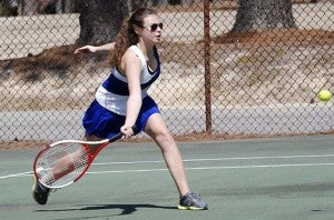 Rachel White, a junior at Southampton Academy, teamed with Olivia Fox for a 6-1 win at No. 2 doubles against Surry High School. -- SUBMITTED/JACK SCHWOLOW