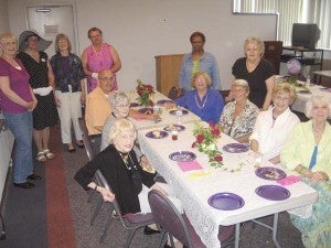 Volunteers at the Ruth Camp Campbell Library in Franklin were treated to a lunch of Southern comfort food on Tuesday. This was in recognition of their service to the library. Frances Golladay, left, in back; Librarian Manager Bonnie Roblin, Marcia Welsh, Public Service Manager Donna Pope, Verta Jackson and Sandy Corpaci; Pat Clark, seated on front left, Rosemary Scott and Bill Billings; Claire Richard, seated on front right, Lane Meredith, Gretchen Hopkins and Barbara Edwards, president of the Friends of the Franklin Library. -- Stephen H. Cowles | Tidewater News