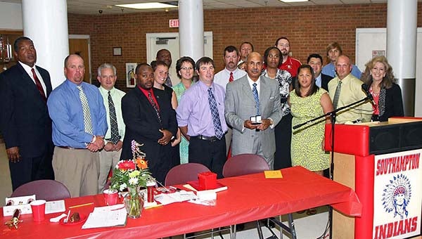 Coaches with Southampton High School handed out awards to the athletes at the spring awards banquet Thursday night. Here are, Willie Gillus, Billy Jenkins, William Overstreet, Eod Charity, Susan Melbye, Wes Griffith, Bonnie Detar, Littleton Parker, III, Amesheia Warren, Tim Mason, Aronda Bell, Will Melbye, Chad Brock, Principal Allene Atkinson; far back: Darian Bell, Buddy Whitehurst, Paul Jackson and Scot Edwards.
