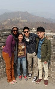 Lawrence, left, and some of her friends, from left, Amelia (England), Nathan Han (California) and Daniel (England) are all smiles at the Great Wall. -- SUBMITTED/DELYDIA LAWRENCE