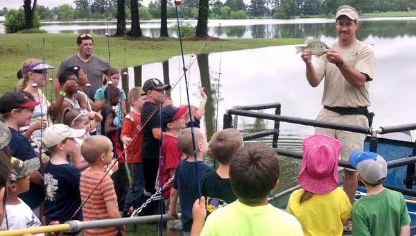 Virginia Department of Game and Inland Fisheries Fish Biologist Chad Boyce explains how redear sunfish, or shellcrackers, got their name from the teeth in their throats that allow them to crush the exoskeletons of snails, muscles, and even clams. -- SUBMITTED