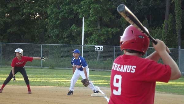 Windsor Gators’ Andrew Holt guards first base against the Smithfield Angels. The Gators, who play in the Bronco League, go to the championship on Saturday against the Washington Nationals. -- STEPHEN H. COWLES | Tidewater News