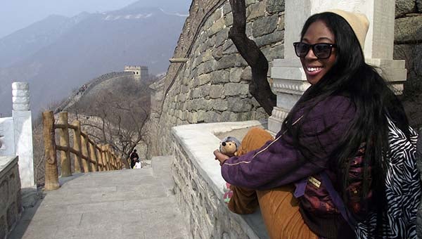 Delydia Lawrence relaxes after hiking to the Great Wall of China on one of her side trips while studying in China. -- SUBMITTED/DELYDIA LAWRENCE