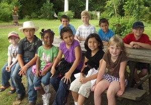 In front, left, Christopher Cornwell, Devin Fisher, Shaundra Sturdifen, Brianna Perez, Aleigha Perez, Madison Broadbent; back, Brock Smith, Daniel Rawles, Matteo Smith and Spencer Fillhart visited the home of David Dundalow and Randy Moore in Courtland to learn about nature from Master Gardeners. -- Stephen H. Cowles | Tidewater News