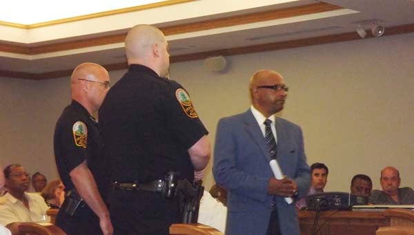 Franklin Police begin to escort Franklin Councilman Greg McLemore after Mayor Raystine Johnson-Ashburn called to have him removed. This came after McLemore alleged her husband had threatened him with physical harm. -- Lucy Wallace | Tidewater News