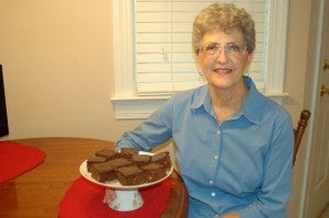 Elaine Wiley of Franklin says she thinks she's a better baker than cook. Beside her is a plate of her fudge brownies, and the recipe is included in this article.