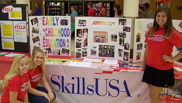 Kinsey Taylor, Mikayla Clarke and Shelby Livingston at the Skills USA table. -- SIDNEY MOORE | TIDEWATER NEWS