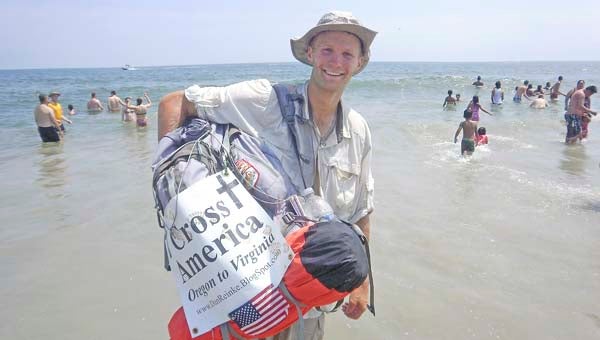 Dan Reinke reached his cross-country destination of the Atlantic Ocean in Virginia on Sunday, Aug. 11. He had been traveling from the Pacific Ocean since Sunday, May 5. The goal of his self-described pilgrimage was to inspire other Christians to live out their faith more fully. -- SUBMITTED