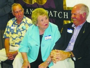 Gaynelle Riddick makes a witty remark during the 40th anniversary of The Peanut Patch. At left is her husband, Bill. They are two of the co-founders of the business. At right is Robin Buck, senior project manager for Virginia Agriculture and Forestry Development Services. -- Stephen Cowles | Tidewater News