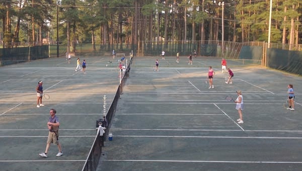 Teams take the court to play in the Tri-Level League games this past week at the Cypress Cove Country Club. -- Submitted