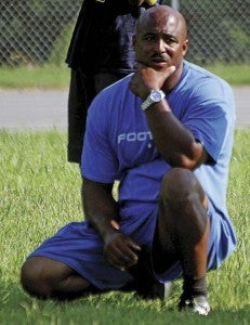 Franklin Head Coach Darren Parker watches his team practice during “Hell Week.” The Broncos are set to play the Lakeland Cavaliers today at 7 p.m. in Suffolk. -- CAIN MADDEN | TIDEWATER NEWS