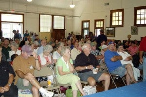 Crowd at Bradshaw’s last auction. -- Merla Monahan | The Tidewater News