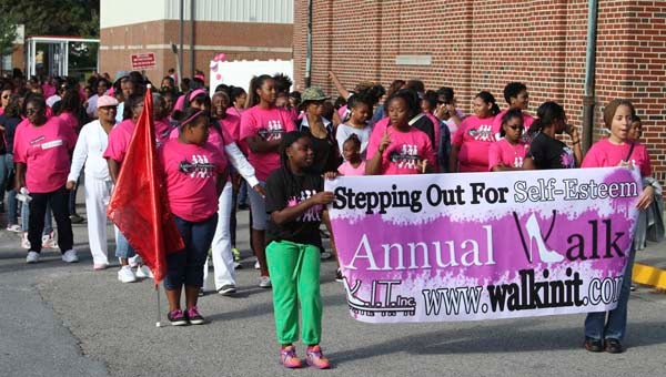 The Walk-in-It rally participants wore either a pink or black T-shirt sporting the logo of the event and a gift bag. -- DON BRIDGERS | TIDEWATER NEWS