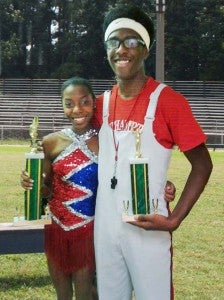 Southampton High School senior Melia Hill, a twirler, holds the first place AA majorette award. With her is senior Vincente Jarratt, a drum major, with the second-place award for drum major. They were part of the Marching Indians who participated last Saturday in the Greensville Classic Competition. -- SUBMITTED