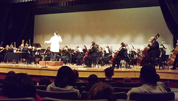Virginia Symphony’s Ben Rous conducts the orchestra during its “Science is Music” program at Southampton High School. Elementary school students and faculty were invited. -- STEPHEN H. COWLES | TIDEWATER NEWS