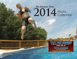 2014 Photo Calendar cover shot of Samantha Albert, 14, jumping into her backyard pool in Zuni. She is the daughter of Chad and Cassandra Albert. Cassandra took and submitted the photo.