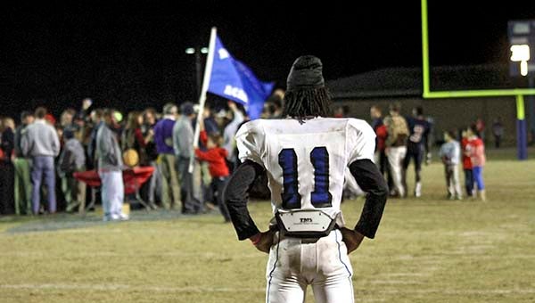 Tonee Hill watches the Eagles celebrate following the 42-30 loss. -- Cain Madden/Tidewater News