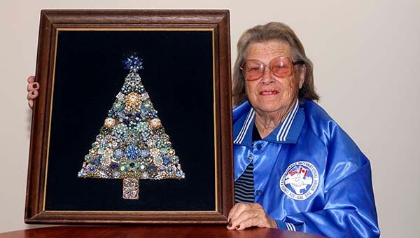 Dorothy Pugh of Franklin displays her arrangement of jewelry that was given to her by her husband Donald. -- CAIN MADDEN | TIDEWATER NEWS