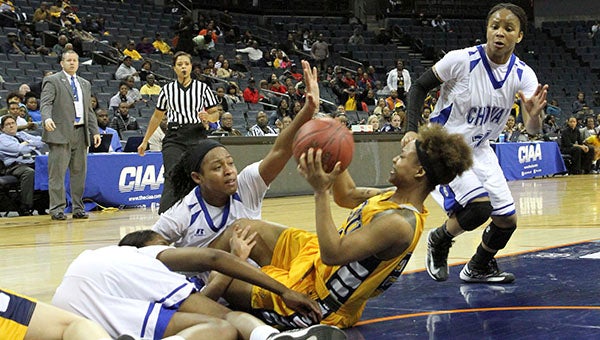 Alisha Mobley fights to the end while on the floor. -- Frank Davis | Tidewater News