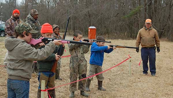 Children shoot at targets with BB guns during the annual Sedley Hunt Club’s Kid’s Day. -- MERLE MONAHAN  | TIDEWATER NEWS
