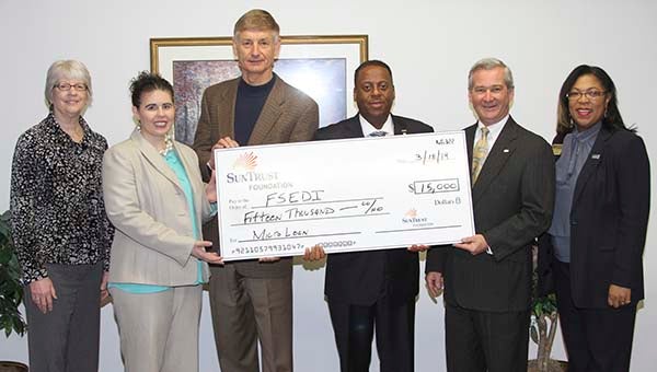 FSEDI receives $15,000 from the Sun Trust Foundation to begin its new micro-loan program. -- Submitted