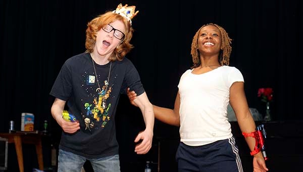 Cullen Porter, left, as Prince No. 3, and Sara Lyons, as Princess No. 4, rehearse a scene from “Crushed,” which will be performed Thursday through Saturday at Franklin High School. -- CAIN MADDEN | THE TIDEWATER NEWS