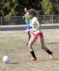 Amanda Rickmon dribbles the ball up the field. -- Cain Madden | Tidewater News