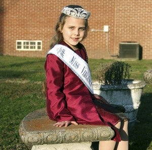 Tatem poses at the town park. Cady is International Junior Miss Princess for Virginia. She will compete for the international princess crown in Virginia Beach in early July. 