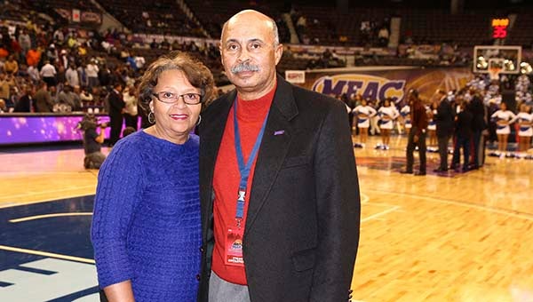 Parker and his wife, Rose, who also enjoys going to basketball games with her husband. -- Frank Davis | Tidewater News