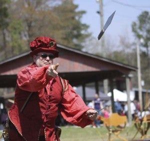 Martin Connelly, better known as Marco De Verona, practices his knife-throwing skills. -- Cain Madden | Tidewater News