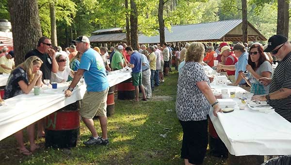 People came from all over Western Tidewater — and some beyond — to enjoy the Western beef barbecue prepared and served by the Hunterdale Ruritan Club. The 51st annual event took place on Wednesday afternoon at the Bronco Rod and Hunt Club. -- STEPHEN H. COWLES | TIDEWATER NEWS