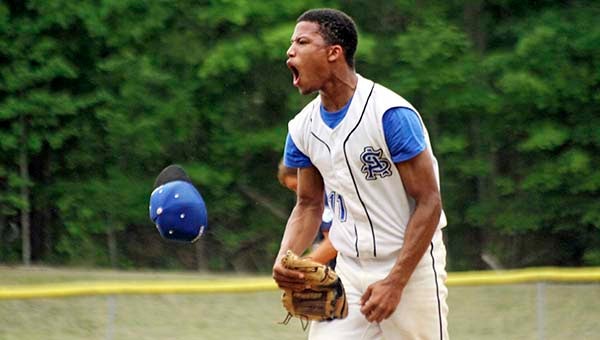 Tonee Hill yells in celebration after the final out. -- Cain Madden | Tidewater News