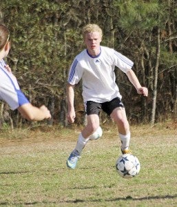 SA’s Colby Blythe looks to take possession of a loose ball. Blythe knocked in the game-winning goal on Wednesday against Blessed Sacrament Huguenot. -- Cain Madden | Tidewater News