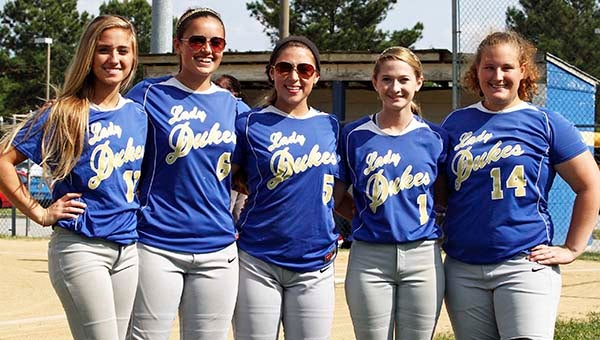 Senior Lady Dukes pose before their game with Lady Cougars. From left, Morgan Burks, Brooke Sutphin, Macayla Servais, Lydia Willis and Abbie Jones. Many of the players have played four years for the Lady Dukes. -- FRANK DAVIS | TIDEWATER NEWS