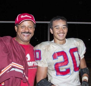 Top, Cyrus Lawrence poses with his son, Chris, after a game. Head Coach Willie Gillus credits Chris’s parents for the success of their son. Bottom left, Lawrence takes part in a tackle during a game against Surry. Bottom right, Lawrence takes down a Surry Cougar solo. -- MURRAY THOMPSON | TIDEWATER NEWS