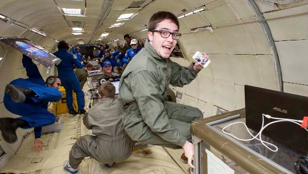 William Archer floats during a NASA-sponsored, zero-gravity flight from Ellington Field in Houston. -- ROBERT MARKOWITZ/NASA