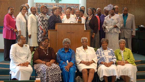 Cancer survivors pose with the Revs. Gloria Newsome and Wendell Waller, pastor of Christian Home Baptist Church. Newsome is assistant pastor of a church in Norfolk. The two preachers are in center of picture. -- SUBMITTED