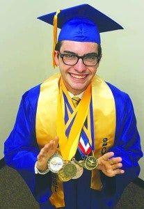 William Archer of Carrsville presents some of the academic awards he has won. -- CAIN MADDEN | TIDEWATER NEWS