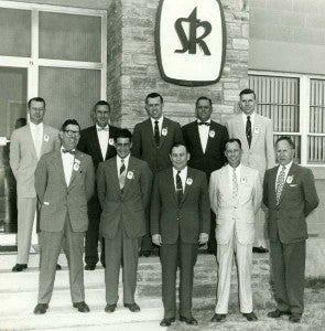 In 1955 at the grand opening. Front row, from left, Bill Harris; Jimmy Surace, plant manager; Jutt Sanford; Curtis Rhodes; and Bill Ludt; back row, from left, George Hedgepeth, personnel manager; Perk Brett, Henry Duck, Shorty Lowe and Jim Curling. -- SUBMITTED | GEORGE HEDGEPETH