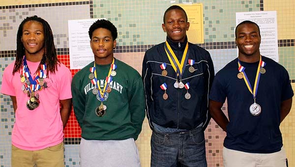Several athletes competed in the State 1A Track and Field Championships this past weekend and all took home medals. From left to right, Marcus Stephens, JaVonte’ Baker, Quayshaun Jefferson and Latrell Lane. -- SUBMITTED