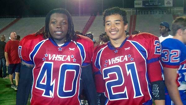 Terry Warren II of Franklin High School, left, and Chris Lawrence of Southampton High School, played together on the defensive side of the ball in the East vs. West All-Star Game. The players were also roommates for the week. -- SUBMITTED | DARREN PARKER