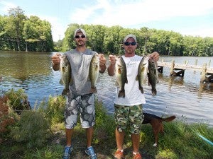 Kevin Gunn, left, and Jonathan Whitley took second place in the Three River Bass Tournament Series event on the Nottoway.