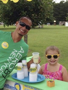 Matt Robinson dropped by to buy a cup of lemonade from Cooper Bass. -- SUBMITTED