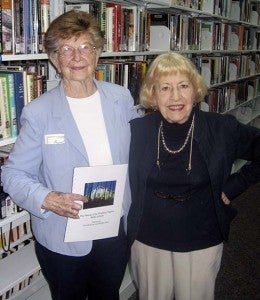 Lois Minetree, left, with her friend, the late Patricia Clark, former head librarian in Franklin. In remembrance of Clark, the Ruth Camp Campbell Memorial Library will install a gazebo for its patrons. -- FILE PHOTO