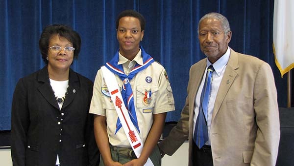Arthur Johnson with his parents, Joyce and Forrest Johnson. Two weekends ago, Arthur received his Eagle Award during a ceremony at High Street United Methodist Church. He’s a member of Boy Scout Troop 17. -- SUBMITTED | LUCY DREWRY