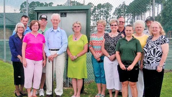 Participants in the dedication ceremony of an information center at Armory Field were, from left, Patsy Joyner, Clay Hyatt, Mary Insull, Kevin Insull, Hersel Flower, Pat Ballard, Gerri Pulley, Betty Howe, Dan Howe, Kristy Thomas, Nellie Kauss, Robert Thomas and Linda Thomas. -- SUBMITTED